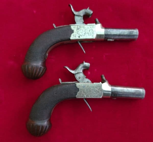 A fine Pair of  cased .32 Percussion  muff pistols by DOOLEY  LIVERPOOL. Circa 1845. Ref 3163